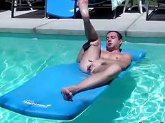 Playing with piss and his dick in the pool