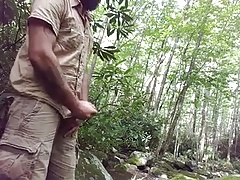 Wanking by a river