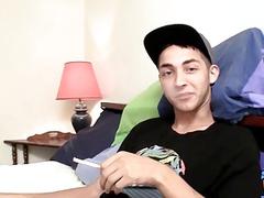 Latino teen works himself with a fleshlight