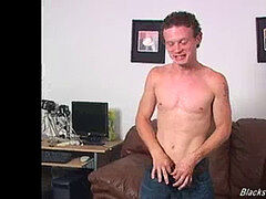 draped dark-hued thug pokes a curly white boy