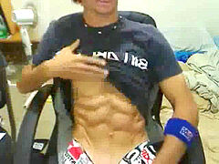 scorching Surfer guy wanking his large manstick.