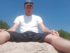 Risky piss and cum on a river bank