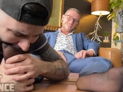 Houseboy Nick Charms serves his chief Colt Spence's feet and man meat