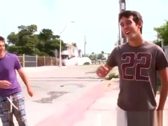 Gay plays with his cock on the streets
