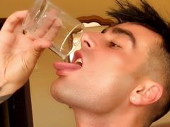 Twink with thick cock and bouncing balls cums in a cup and drinks own cum