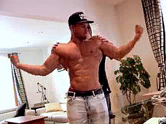 successful boy touches Jock's Muscles