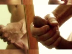 Super-Steamy Dude Unwraps n Masturbates n Shoots A Load on Mirror !!