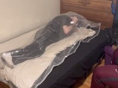 Leather-clad bondage with breath control in uniform featuring Strapskinks