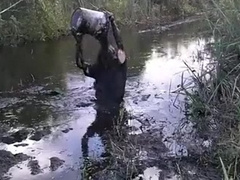 Dark Everglades swamp mud