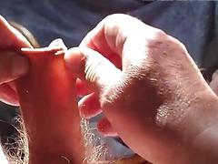 Amateur manipulates his stretchy foreskin