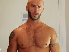 Muscular dudes jerking off in the shower, showing off their bubble butts