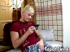 Good looking twink jacks off his trimmed cock all alone