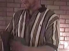 Mature guy with tattoos is jerking his throbbing manhood