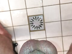 Shower pissing in micro chastity cage with penis plug POV