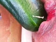 Summertime with assplaying with a courgette