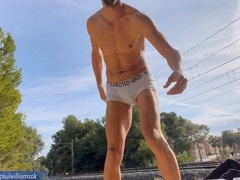 Exhibitionist gay with a perfect body flaunts his smooth ass in public