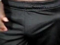 Big-Headed Black Cock in Shorts