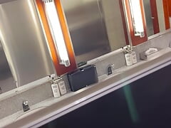 Public play in airport bathroom. Cuckold husband