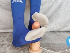 Sockjob with blue Adidas soccer socks
