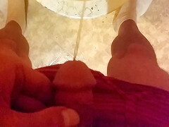 Peeing and cock play in bathroom.