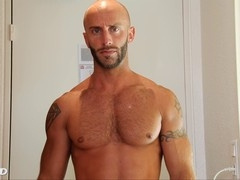 Muscular dudes jerking off in the shower, showing off their bubble butts