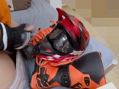 Jizz on biker boots and helmet during playful dildo session