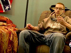 Nerdy looking man with glasses disrobes down and drains it off