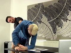 Tight blonde bloke enjoys sex on the desk with one of his colleagues