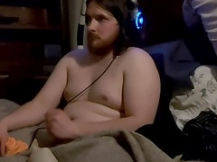 Geeky guy jerking off alone