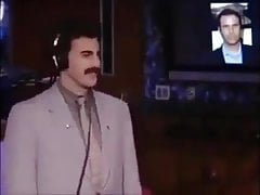 Borat kisses Howard Sterns penis with pants.