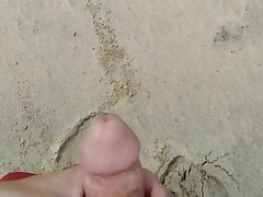 Cumming at a lonely beach