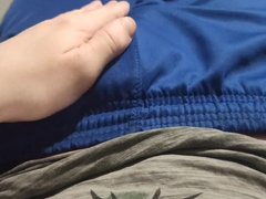 A stud in blue sweatpants caresses his swelling