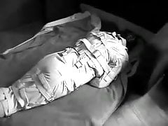 Trapped in Straitjacket and Straitpants can't see or speak