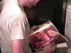 Redheaded older guy masturbates his massive cock in the kitchen