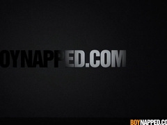 Eyes covered lad Casper Ellis tantalized by Xavier Sibley