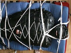 In the leather bodybag, slave gets a CBT by NeonWand