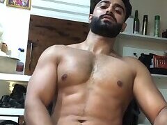 Handsome hunk stroking his thick cock