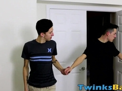 Bareback fucking between twink with tats and his young pal