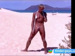 Tanned guy on beach in tiny string thong (temporarily!) 10