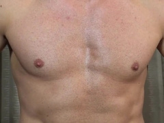 Muscled guy jerks off