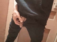 Adorable Japanese guy urinates in the restroom while wearing multiple layers of clothes and underwear