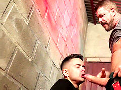 Robbie drops to his knees to prime Roccos fat contraption