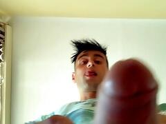 Twink with thick cock and bouncing balls cums in a cup and drinks own cum