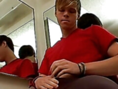 Twink shows his shaved cock off and tugs on it