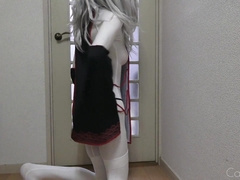 White crossdresser cat wears asian vampire costume and mittens