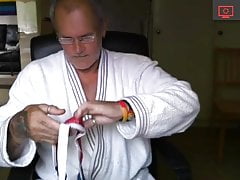 in a bathrobe and without