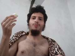Homosexual munching bananas, man