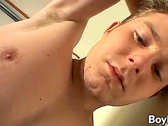 Young tattooed fellow masturbating his boner before busting a nut