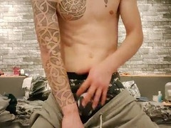 Cute suspended twink having fun with his cock