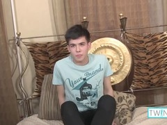 Adorable brunette Alexandre Lee plays with himself while stretching his tight ass